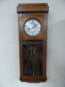 Antique wall clock possibly American (weights and pendulum in office). Approx 95cm H