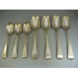 Set of Four London hallmarked silver serving spoons along with three matching desert spoons by