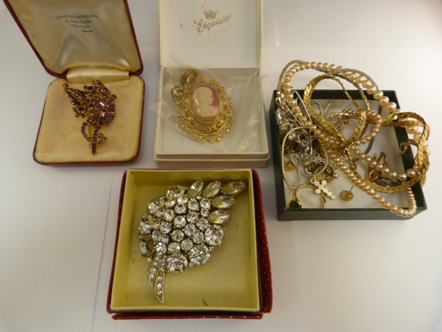 Three various brooches and various chains etc