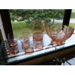 Pink glass cocktail bowl and jug along with six matching glasses