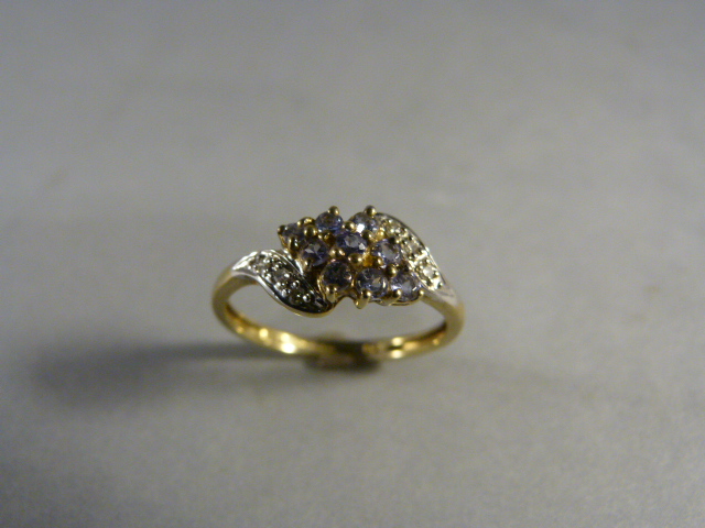 Blue Topaz and diamond cluster ring in 9ct Gold - set with six small diamonds in illusion setting in - Image 2 of 2