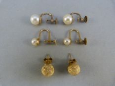 Pair of 9ct Gold screw back cultured pearl earrings, one with approx 8mm pearls and the other with