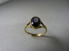 9ct Gold Amethyst Solitaire Ring. The Oval stone approx 8.8mm x 7mm (including Setting) UK - L USA