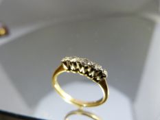 18ct Gold ring set with 5 diamonds