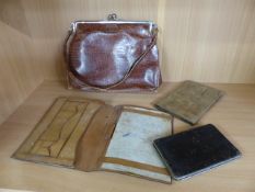 Vintage leather handbag and three various purses