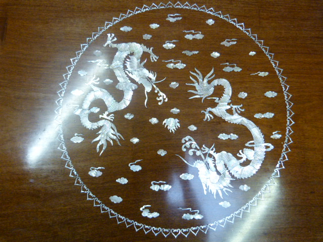 Chinese Rosewood coffee table inlaid with mother of pearl depicting dragons amid clouds. Pierced - Image 2 of 3