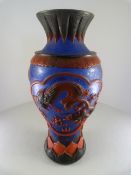 A large blue Peking glass vase (blue glass contains flecks of gold) overlaid with red glass and