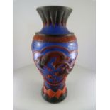A large blue Peking glass vase (blue glass contains flecks of gold) overlaid with red glass and