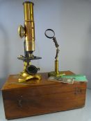 A Brass and lacquered two part tube telescope on Y framed stand - no makers mark and fitted to
