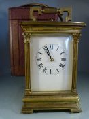 Brass cased carriage clock fitted with 5 bevelled glass panels. Inside lays a twin barrel striking
