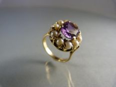 9ct Gold Amethyst and Pearl Ring. Central oval amethyst approx 10mm x 8mm surrounded by 10 approx