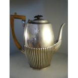 A silver coffee pot (hallmarks worn) with partly fluted decoration. Total weight Approx. 797g.