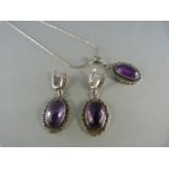 Silver marcasite and Amethyst pendant and earrings set Gross weight 22g