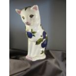 Wemyss Pottery figure of a seated cat from the Animals Collection 1996. Decorated with fruit and