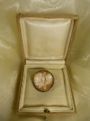 Silver (900) Cameo Brooch, the Circular Brooch measures approx: 27.25mm in diameter, and is carved