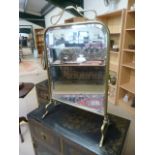 Art Nouveau brass fire screen with bevelled mirror