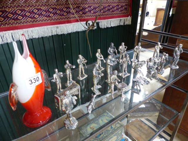 Quanity of silvered figures of 'Tradesmen' and a 'Jazz Band' also to include a glass fish