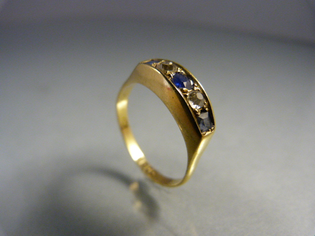 18ct Gold boat shaped sapphire and diamond ring. Centre sapphire approx 3.25mm in diameter with a - Image 2 of 2