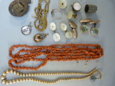 Small box containing various silver pieces and a coral necklace