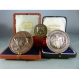 Two medals/medallions to include: Clifton College boxed medal "spiritus intus alit"; A Bronze