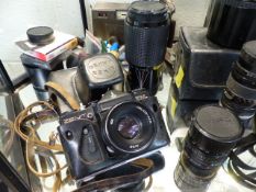 Collection of camera's - Sigma lense in case, Canon Lenses, Canon camera, Florett radio, Zenit