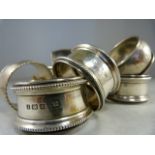 Three silver napkin rings by Charles Wilkes, two by William Hair Haseler and three further stamped
