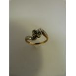 Platinum and 9ct 2 stone diamond cross over ring by Bravintons - each old cut diamond in approx 0.