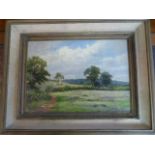 J B Noel oil on canvas of a Farming landscape summer scene - hauling hay date unreadable. signed