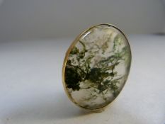 Unmarked Gold Victorian Moss agate brooch, measuring approx: 28mm x 34.4mm including mount.