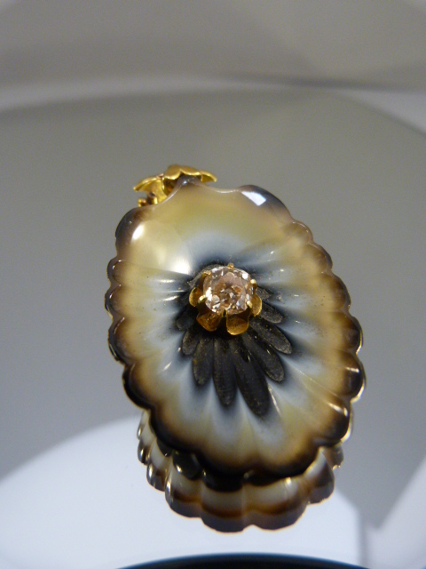 Carved Banded Agate in the form of a Sea Shell Pendant, possibly by Watherston & Son, with