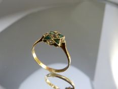 18ct Art Deco ring with star configuration of Emeralds and Diamonds