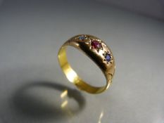 High carat but marks rubbed Sapphire and Ruby Gypsy Ring approx 8mm at the wide head. Central Ruby