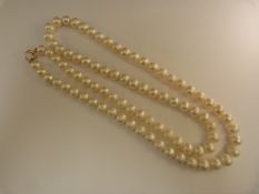 Freshwater cultured pearl necklace 35" long approx 10.2mm pearls with 9ct clasp