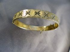 Hallmarked Silver Gilt bangle c1970 - Safety chain needs repair. Star decoration