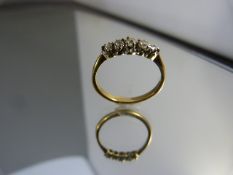 5 Stone diamond ring set in 18ct Gold. Weight 1.9g, size L