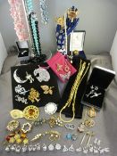 Collection of costume jewellery to include ring tree etc