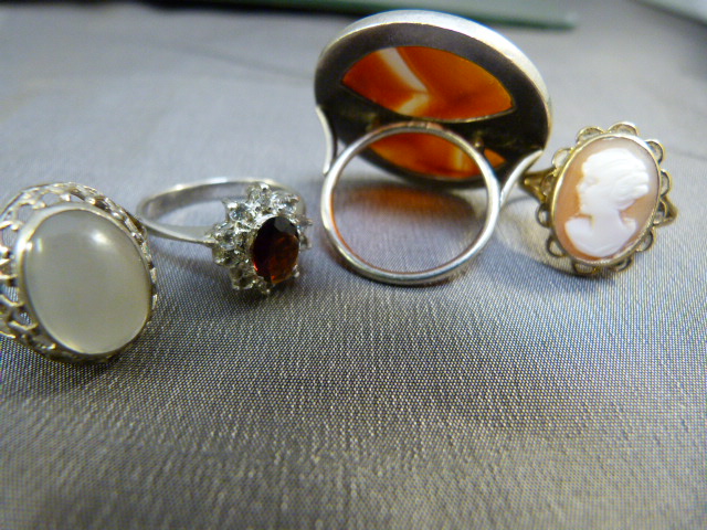 Three Silver rings - Garnet CZ, Moonstone and Agate and a 9ct gold set cameo ring - Image 4 of 4