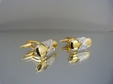 Pair of gold diamond encrusted cufflinks