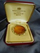 Victorian Unmarked Gold and Banded Agate Brooch with typical sentimental Ivy leaf border.