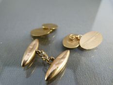 Pair of 9ct Gold cufflinks hallmarked Birmingham 1950 with engine turned design and one other Rose