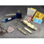 Mother of pearl handled fruit knives and other pocket knives along with a Rose Quartz pendant and