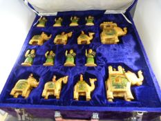 Velvet lined box containing various chess pieces (complete set, no board)