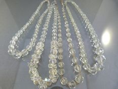 Four crystal necklaces - some on original silver chains with silver clasps, some new restrung. one