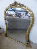 Gilt overmantle mirror with floral finial to top