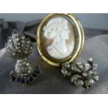 Pinchbeck Cameo Mourning brooch along with a Silver paste brooch marked 900 and one other with