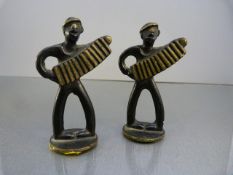 Pair of Novelty Match Strikers in the form of possibly Italian men playing the accordian, The