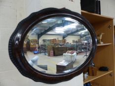 Oval framed mahogany mirror