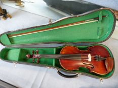 Violin with internal label as follows: A large picture of Charles Tweedale appears above the