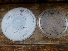 Pair of Stereophonics Remo Drumskins each with five band member signitures