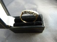 5 Stone diamond ring set in 18ct Gold set in Platinum
